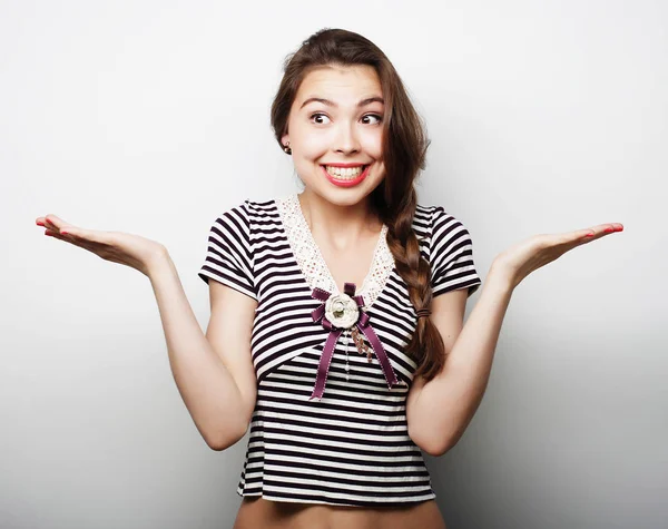 Joven mujer sorprendida. Captura de estudio . —  Fotos de Stock