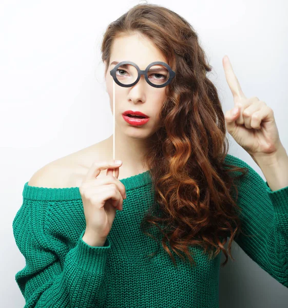 Attractive playful young woman with false glasses — Stock Photo, Image