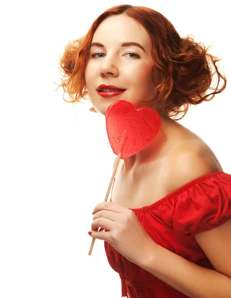 Redhair vrouw met groot hart karamel — Stockfoto