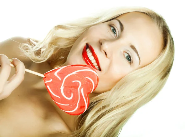 Woman with heart lolly pop Stock Picture