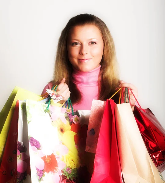 Shopping beauty girl on white background — Stock Photo, Image