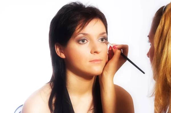 Makeup artist på jobbet — Stockfoto
