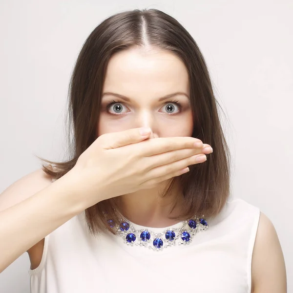 Woman covering the face with her hand — Stock Photo, Image