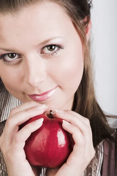 Young smiling woman with red apple. — Stock Photo, Image