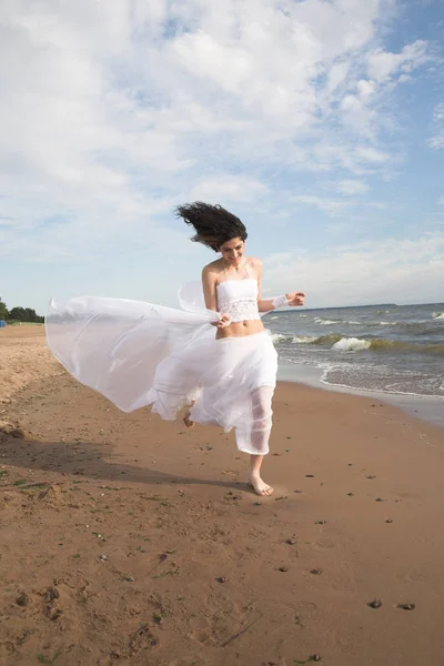 White angel on the beach — Stock Photo, Image