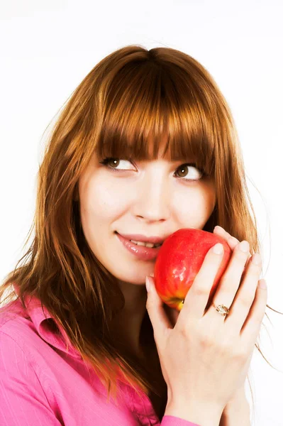 Pelirroja chica con manzana — Foto de Stock