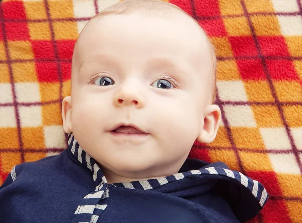 Smiling child with blue eyes — Stock Photo, Image