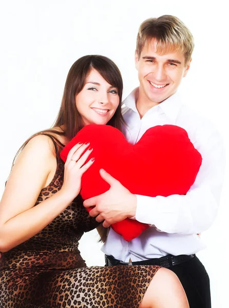 Feliz pareja sonriendo sobre un fondo blanco — Foto de Stock