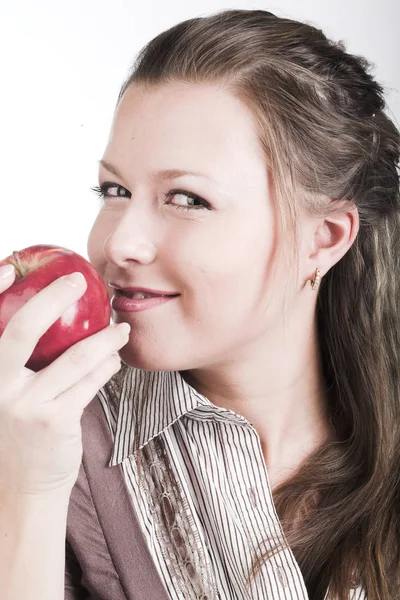 Young smiling woman with red apple. — Stock Photo, Image