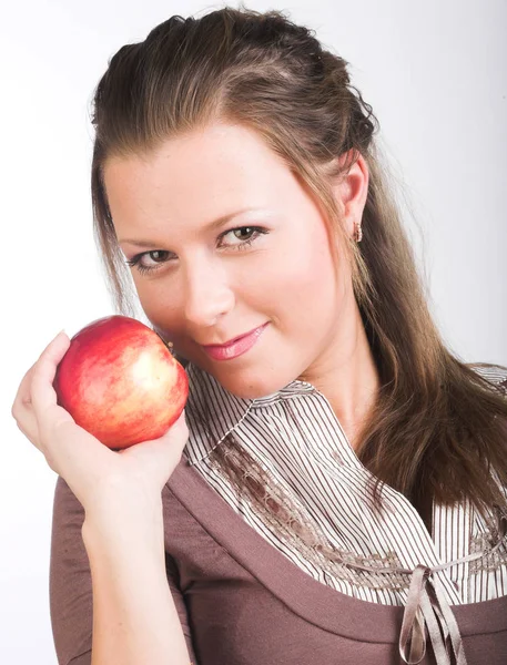 Young smiling woman with red apple. — Stock Photo, Image
