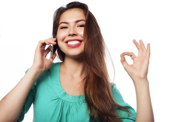 Portrait of young woman on phone call — Stock Photo, Image