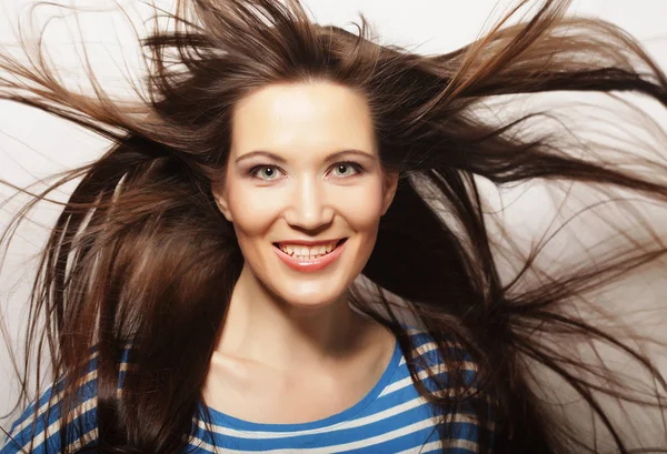 Lifestyle and people concept: Beautiful adult woman with wind in — Stock Photo, Image