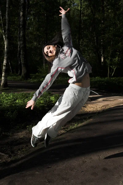 Slim shaped beautiful girl jumping — Stock Photo, Image