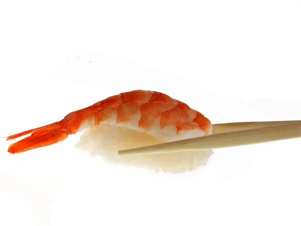 Sushi with chopsticks shot on white — Stock Photo, Image