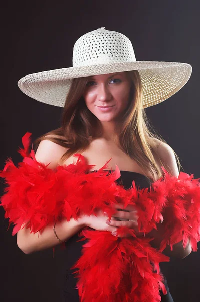 Girl in hat and boa — Stock Photo, Image