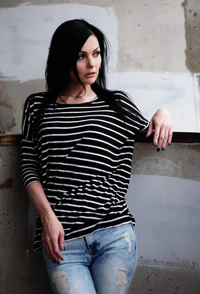 Beautiful young woman in a striped T-shirt — Stock Photo, Image