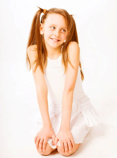 Little girl in white dress — Stock Photo, Image