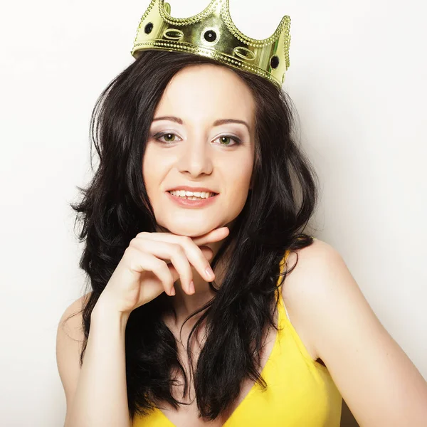 Pretty brunette woman wearing crown — Stock Photo, Image