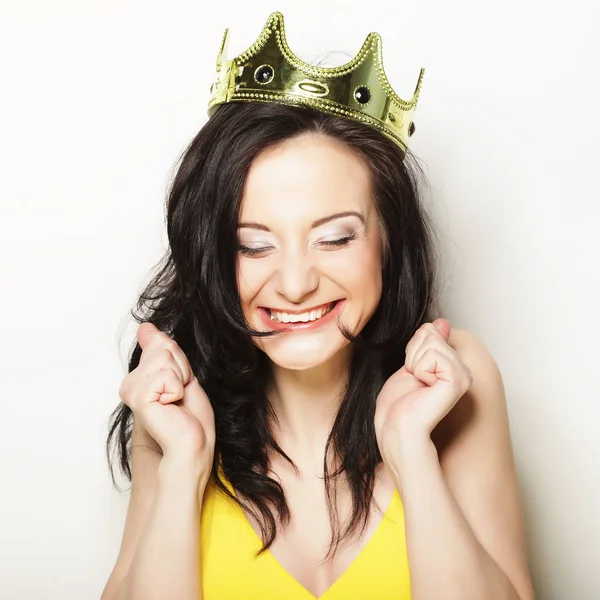 Pretty brunette woman wearing crown — Stock Photo, Image