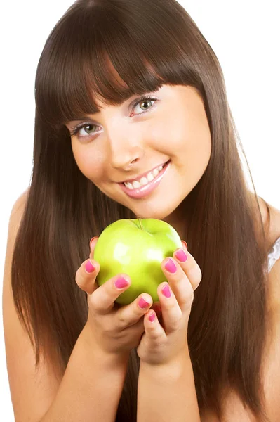 Beautiful young woman holding a green apple — Stock Photo, Image