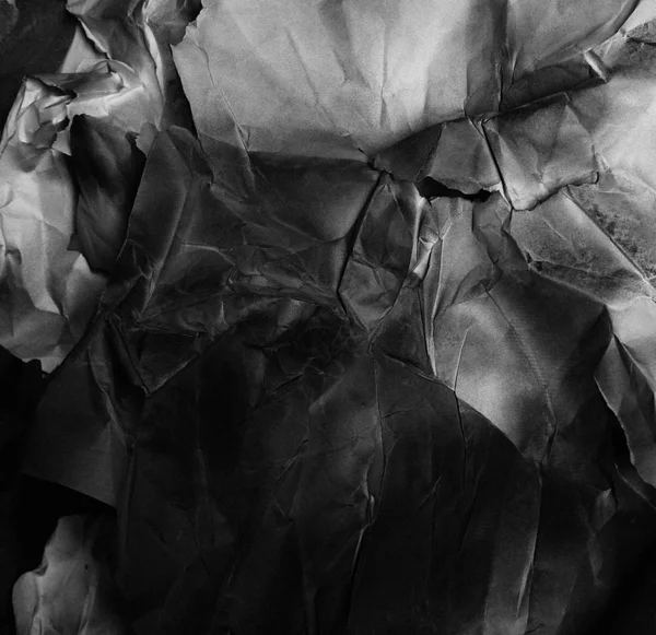 stock image crumpled black paper, background