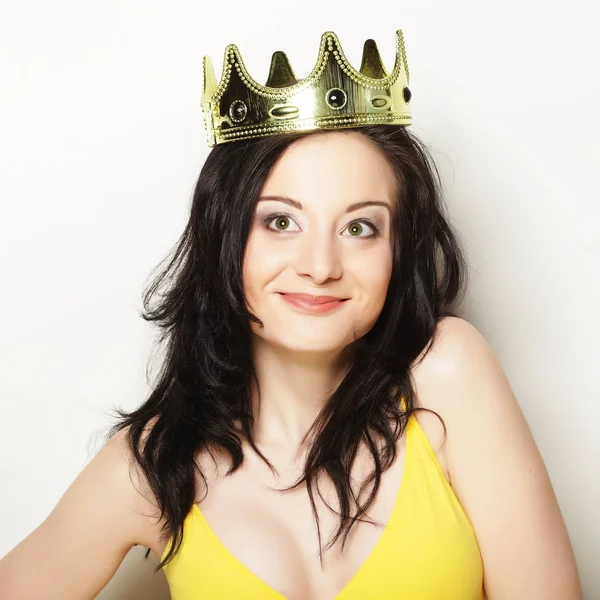 Pretty brunette woman wearing crown — Stock Photo, Image