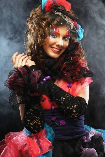 Portrait of young woman with creative make-up in doll style — Stock Photo, Image