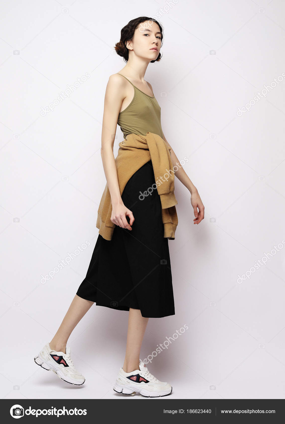 Young blonde woman dancing dance hall with in squatting pose. Full body  length portrait isolated on white studio background. Stock Photo | Adobe  Stock