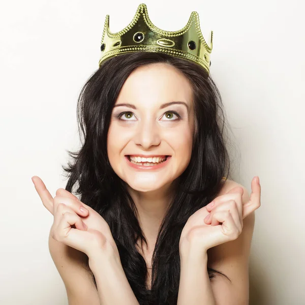 Pretty brunette woman wearing crown — Stock Photo, Image