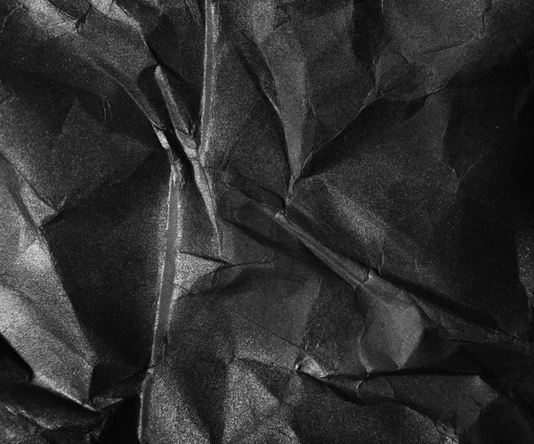 Crumpled black paper, background — Stock Photo, Image
