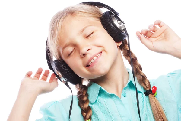 Technology, people and music concept - little girl with headphones — Stock Photo, Image