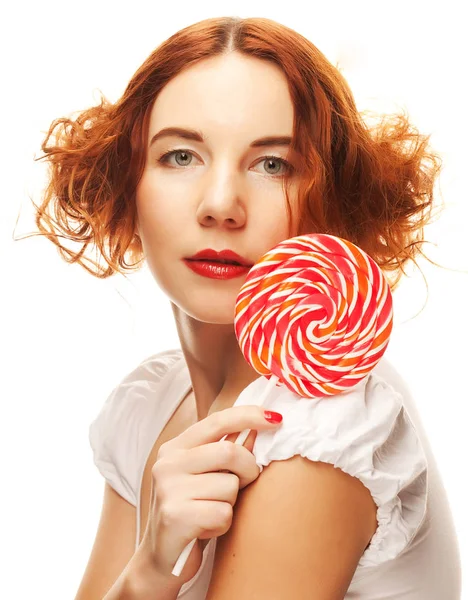 Vacker kvinna med lollipop. — Stockfoto