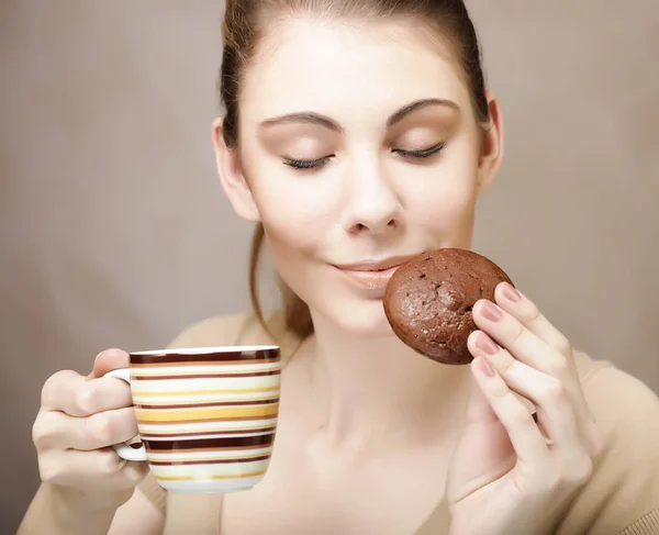 Woman with coffee and cookies — Stock Photo, Image