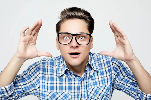 Astonished young crazy man feels stress. — Stock Photo, Image