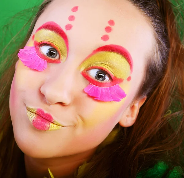 Menina engraçada com maquiagem louca — Fotografia de Stock