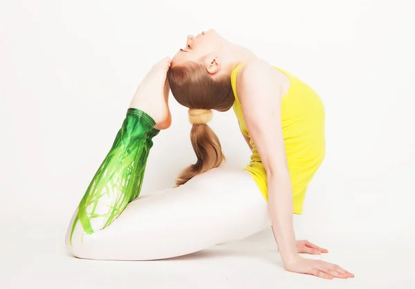 Portrait of attractive woman doing yoga, pilates. Healthy lifestyle and sports concept. — Stock Photo, Image