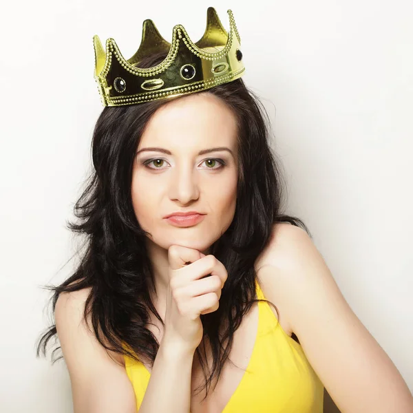 Lifestyle, people and emotional concept: young woman in crown — Stock Photo, Image