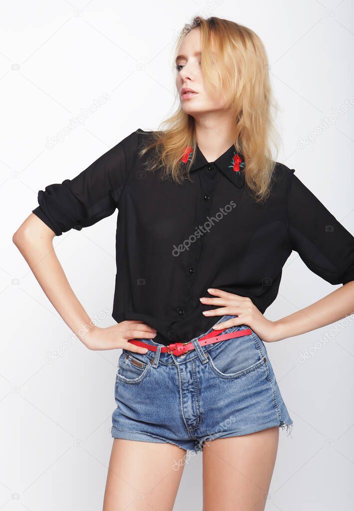 fashion blond woman model posing in studio