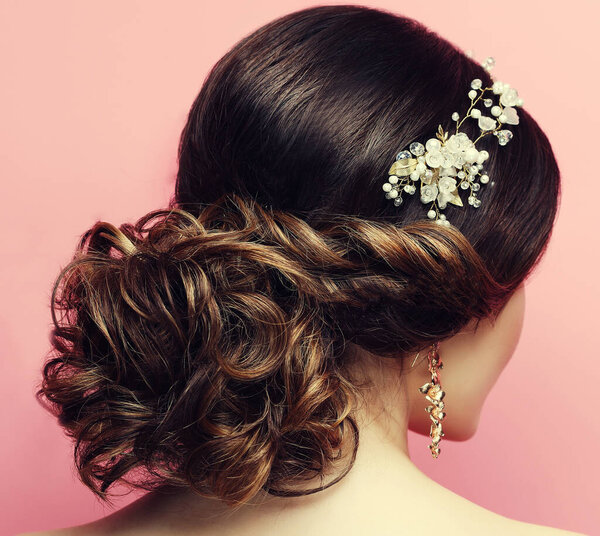 young woman with beautiful hairstyle and stylish hair accessory