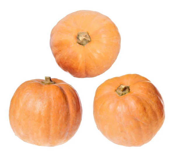 Tres calabazas anaranjadas aisladas en blanco —  Fotos de Stock