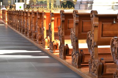 Rows of benches in a church clipart