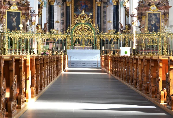 Rows of benches in a church — Stock Photo, Image