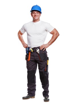 Tamirci beyaz arka plan ince portre üzerinde gülümseyen