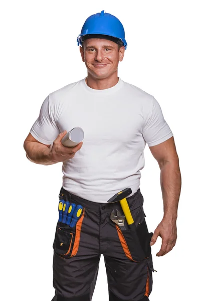 Smiling handyman on white background fine portrait holding plans — Stock Photo, Image