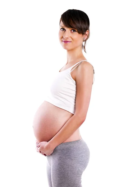 Mooie zwangere vrouw - geïsoleerd op een witte pagina — Stockfoto