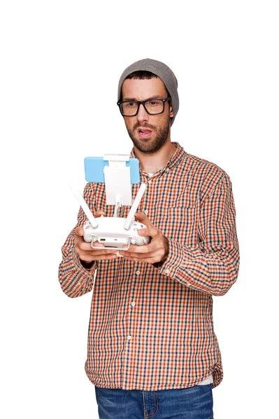 Man with flying drone. Studio shot on white background, isolated — Stock Photo, Image