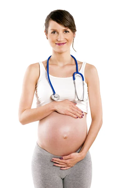 Pregnant woman listen with stethoscope her baby. Pregnant belly — Stock Photo, Image