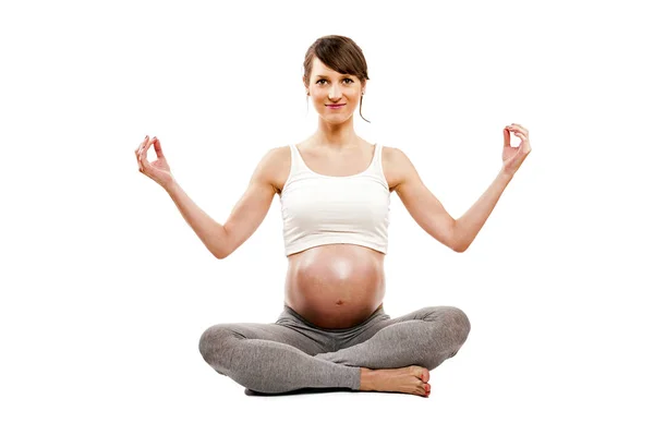 Роздуми про материнство. Крупним планом вагітна жінка медитує w — стокове фото