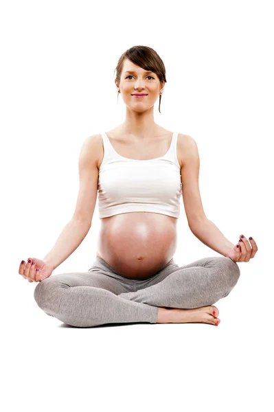 Mediterar på moderskap. Närbild av gravid kvinna mediterar w — Stockfoto