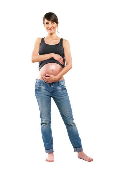 Mooi en gelukkig zwangere vrouw, geïsoleerd op witte achtergrond — Stockfoto